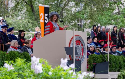 Image of Natalie Lorenz Anderson speaking at the podium during the OneMIT Commencement Ceremony