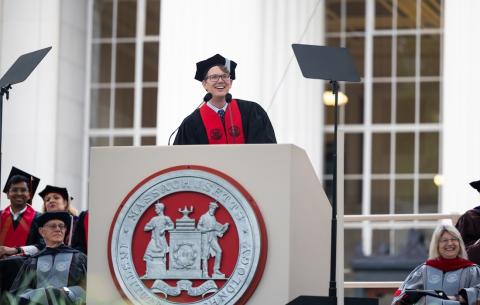 Image of Hank Green speaking at the podium during the OneMIT Commencement Ceremony
