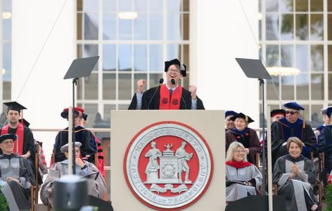 Image of Hank Green speaking at the podium during the OneMIT Commencement Ceremony