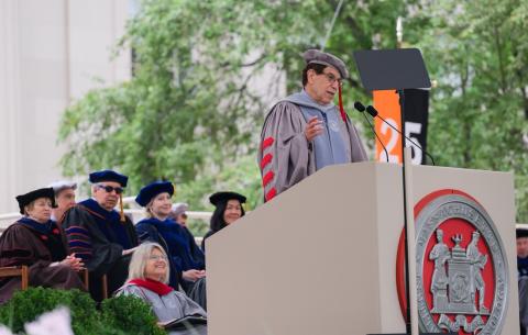 Image of Mark Gorenberg speaking at the podum during the OneMIT Commencement ceremony