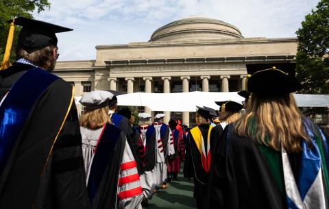 Image of the faculty procession processing into Killian Court