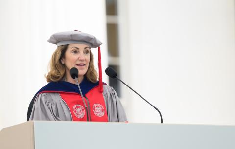 Image of Cynthia Barnhart speaking at the podium during the Undergraduate Ceremony