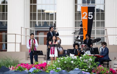 Image of student performers performing during the Undergraduate Ceremony